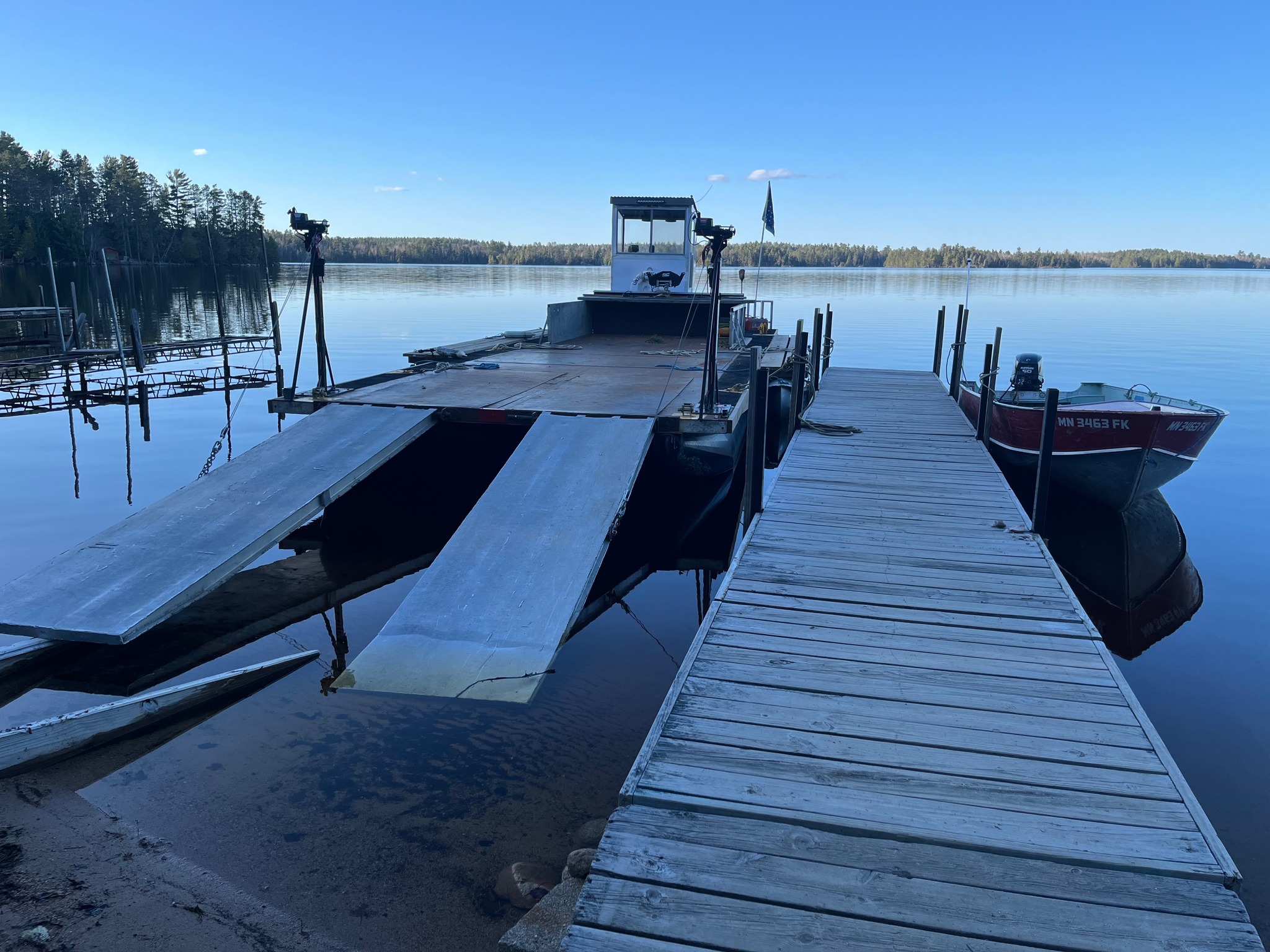 Elbow Lake Barge on the water